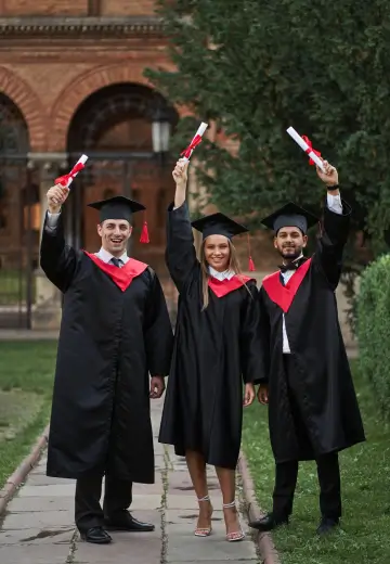 A joyful assembly of graduates, each holding their diplomas, symbolizing their hard work and success in education.